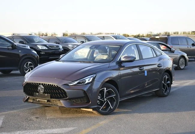 New MG 5 (GT) II, 1.5 l, 2025 in Dubai by AL MADINA CARS FZE, Grey color. GCC Specs | AUTO.AE