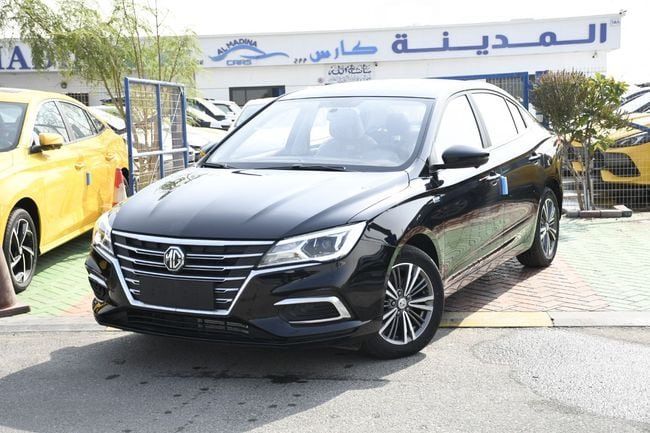 Новый MG 5 (GT) II, 1.5 л, 2025 в Дубае от AL MADINA CARS FZE Черный цвет. GCC | AUTO.AE