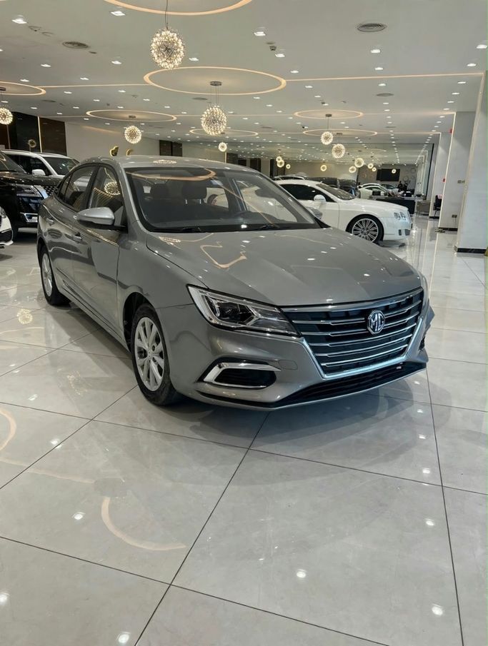Подержанный ⁦MG 5 (GT) I Рестайлинг, 1.5 л, 2023⁩ в ОАЭ, Дубай от MASTER CARS USED CARS Серый цвет. GCC | AUTO.AE | Объявление #287307