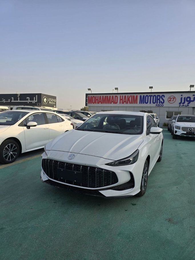 Новый MG 5 II Рестайлинг (GT), 1.5 л, 2025 в Дубае от Mohamed Hakim Motors Белый цвет. Other | AUTO.AE
