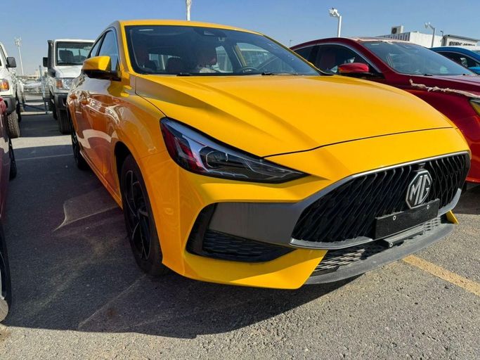 New MG 5 II, 1.5 l, 2024 in Dubai by Mohamed Hakim Motors, Yellow color. Other | AUTO.AE