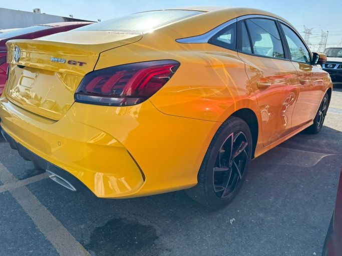 New MG 5 II, 1.5 l, 2024 in Dubai by Mohamed Hakim Motors, Yellow color. Other | AUTO.AE