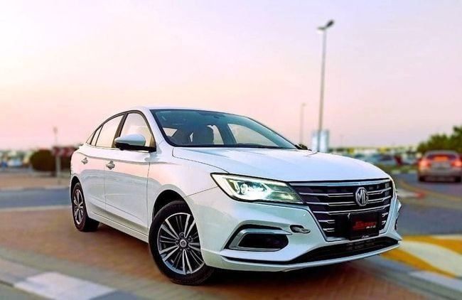 New MG 5 I Facelift, 1.5 l, 2023 in Dubai by Soltan Auto, White color. GCC Specs | AUTO.AE