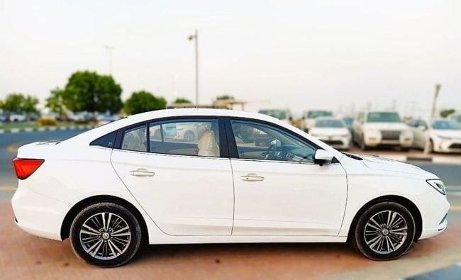 New MG 5 I Facelift, 1.5 l, 2023 in Dubai by Soltan Auto, White color. GCC Specs | AUTO.AE