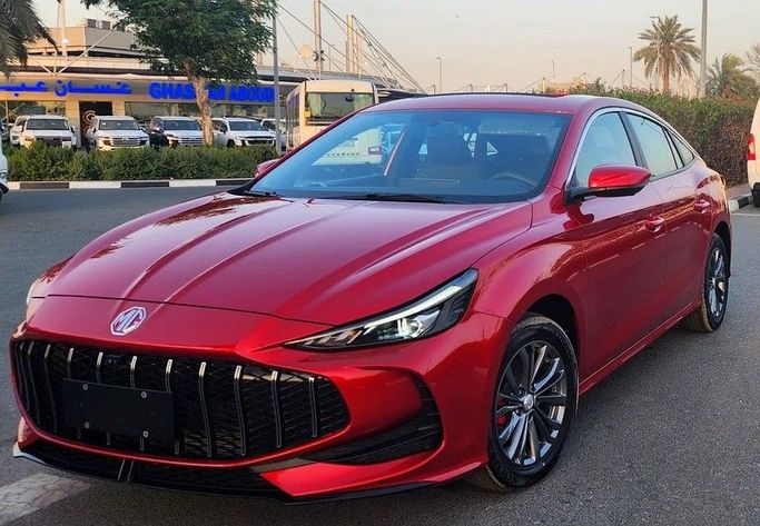 New MG 5 II Facelift, 1.5 l, 2024 in Dubai by Passion Motors, Red color. Chinese Specs | AUTO.AE