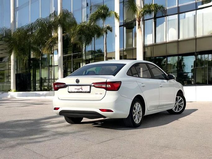 Подержанный MG 5 I Рестайлинг, 1.5 л, 2023 в Дубае от Andaleeb Cars Белый цвет. GCC | AUTO.AE