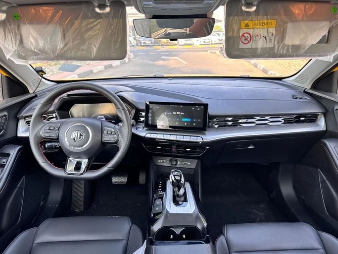 Новый MG 5 II, 1.5 л, 2024 в Дубае от Allied Motors Желтый цвет. Китайская | AUTO.AE