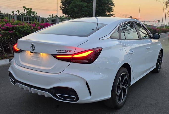 New MG 5 II Facelift, 1.5 l, 2025 in Dubai by Passion Motors, White color. Chinese Specs | AUTO.AE