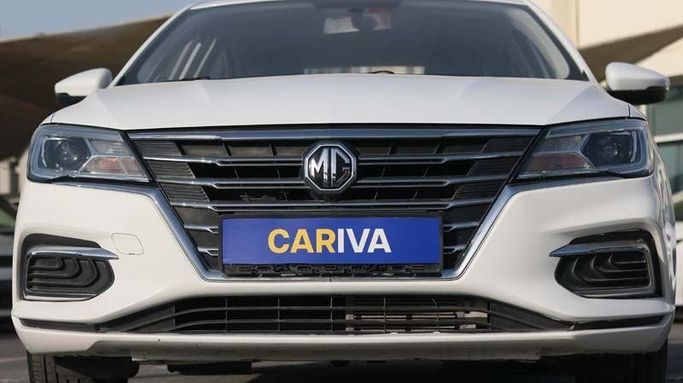 Used MG 5 I Facelift, 1.5 l, 2023 in Dubai by Cariva Used Cars , White color. GCC Specs | AUTO.AE