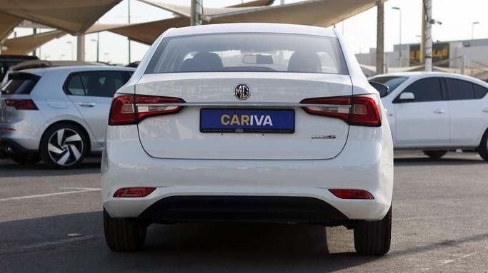 Used MG 5 I Facelift, 1.5 l, 2023 in Dubai by Cariva Used Cars , White color. GCC Specs | AUTO.AE