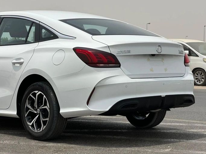 Новый MG 5 II, 1.5 л, 2025 в Дубае от World Center Motors FZE Белый цвет. Китайская | AUTO.AE