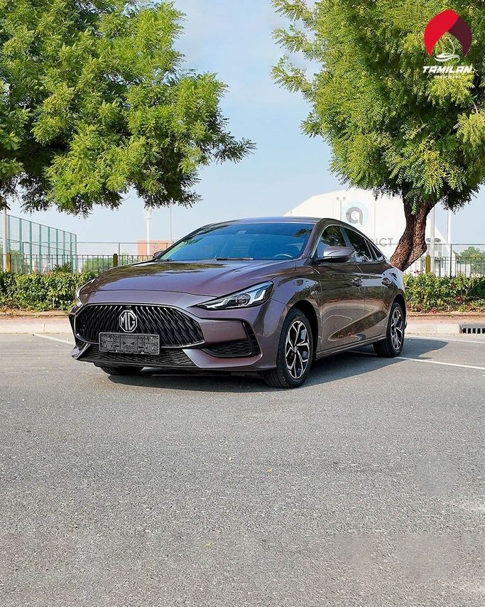 Подержанный MG 5 (GT) II, 1.5 л, 2023 в Дубае от Tamilan Specialized Vehicles Trading LLC Пурпурный цвет.  | AUTO.AE