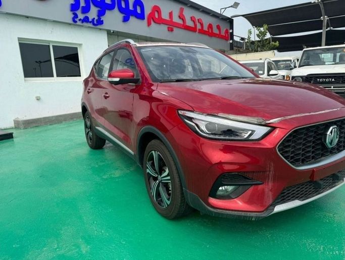 New MG ZS II Facelift, 1.5 l, 2024 in Dubai by Mohamed Hakim Motors, Red color. GCC Specs | AUTO.AE