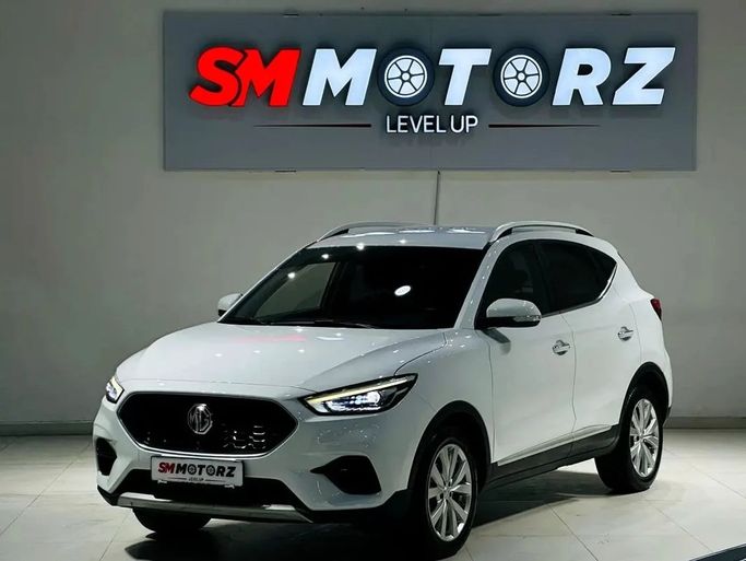 Подержанный MG ZS II Рестайлинг, 1.3 л, 2024 в Дубае от SM MOTORZ Белый цвет. GCC | AUTO.AE