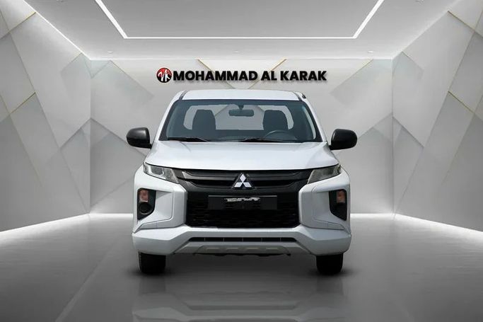 Used Mitsubishi L200 V Facelift, 2.4 l, 2019 in Dubai by Mohammad Alkarak Motors, White color. GCC Specs | AUTO.AE