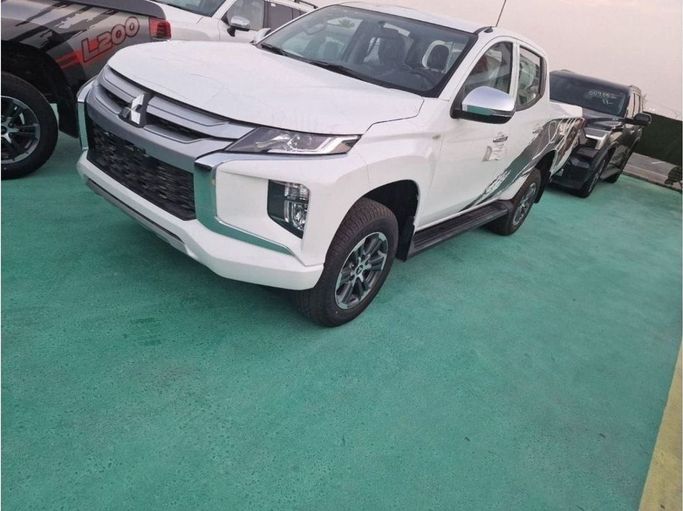 New Mitsubishi L200 V Facelift, 2.4 l, 2023 in Dubai by Mohamed Hakim Motors, White color. GCC Specs | AUTO.AE