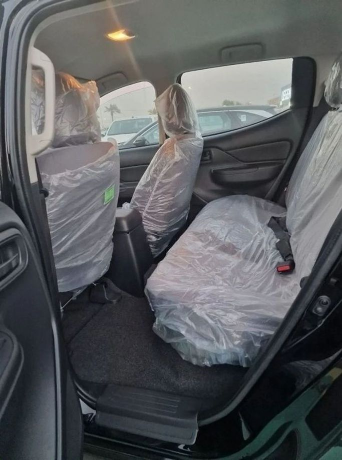 New Mitsubishi L200 V Facelift, 2.4 l, 2023 in Dubai by Mohamed Hakim Motors, White color. GCC Specs | AUTO.AE