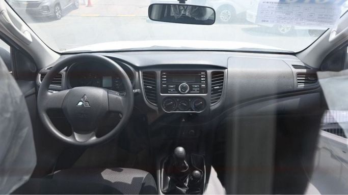 New Mitsubishi L200 V Facelift, 2.5 l, 2024 in Dubai by Mohamed Hakim Motors, White color. GCC Specs | AUTO.AE