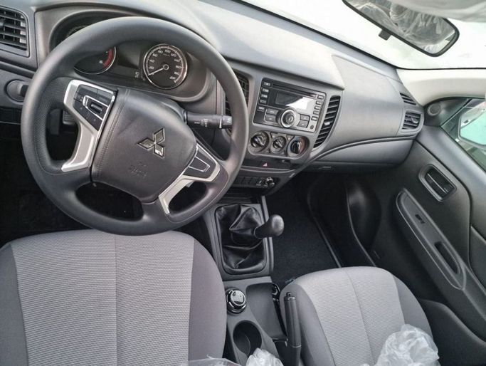 New Mitsubishi L200 V Facelift, 2.4 l, 2023 in Dubai by Mohamed Hakim Motors, Black color. Other | AUTO.AE