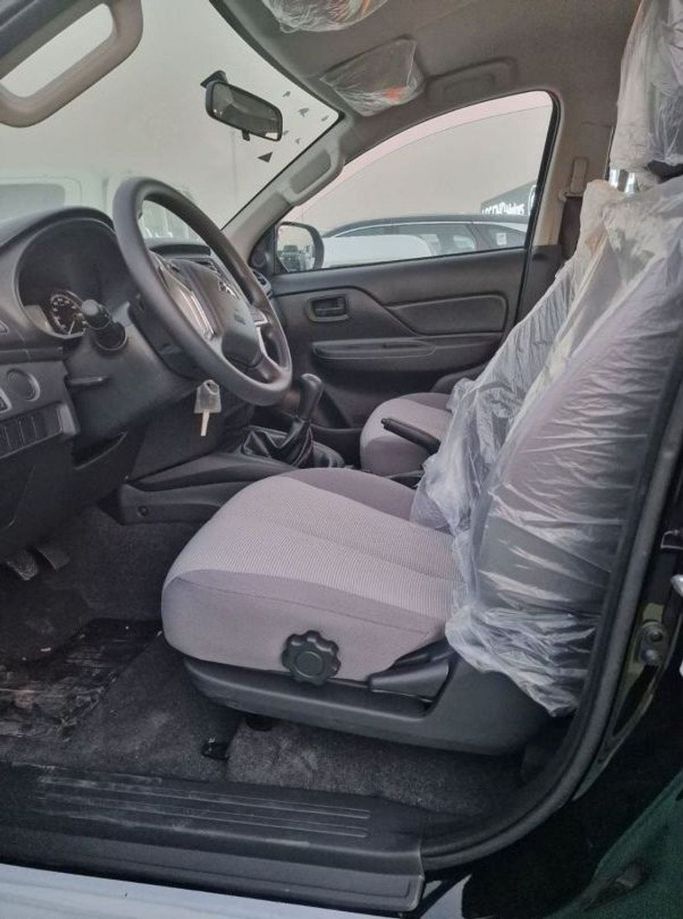 New Mitsubishi L200 V Facelift, 2.4 l, 2023 in Dubai by Mohamed Hakim Motors, Black color. Other | AUTO.AE