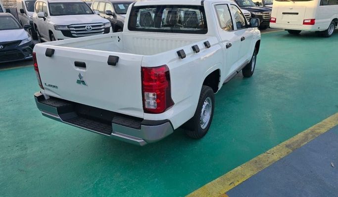 New Mitsubishi L200 V Facelift, 2.4 l, 2025 in Dubai by Mohamed Hakim Motors, White color. GCC Specs | AUTO.AE