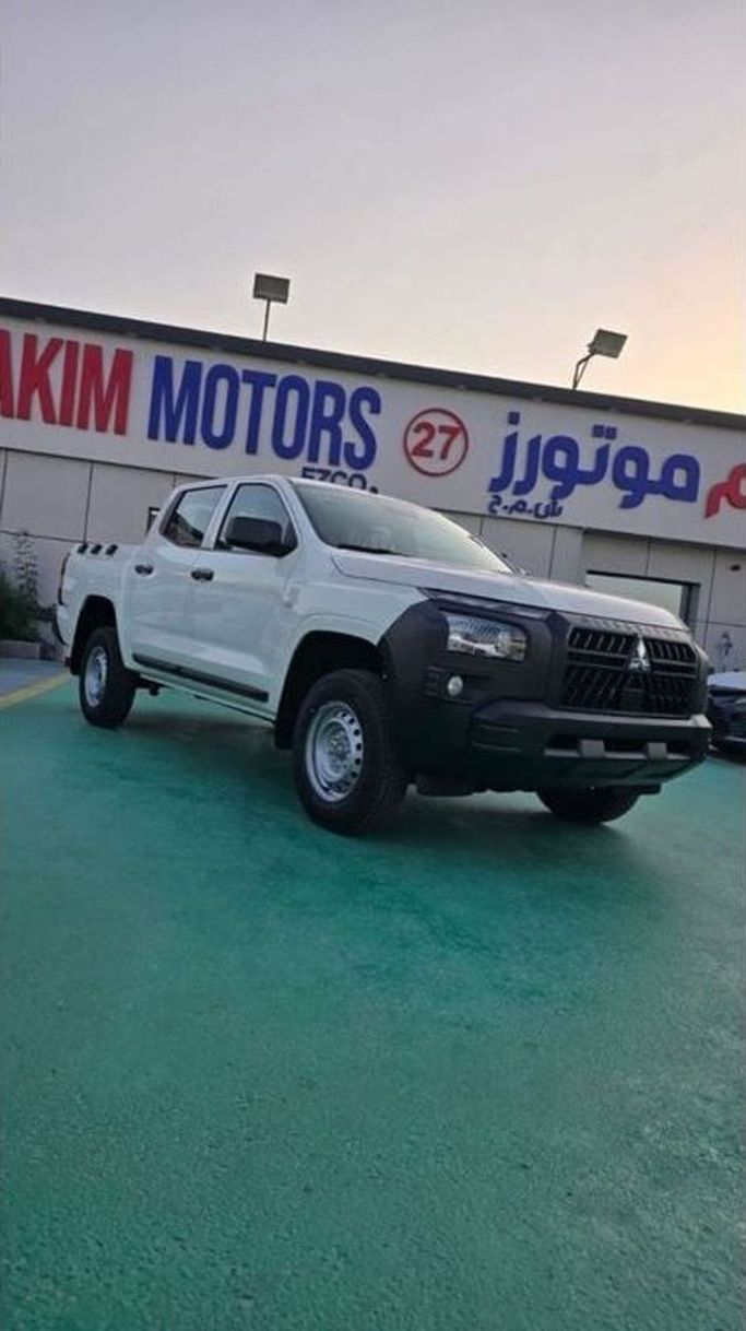 New Mitsubishi L200 V Facelift, 2.4 l, 2025 in Dubai by Mohamed Hakim Motors, White color. GCC Specs | AUTO.AE