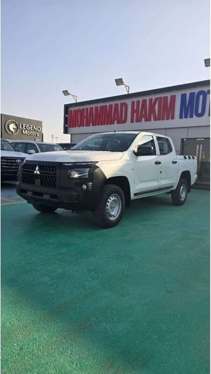 New Mitsubishi L200 V Facelift, 2.4 l, 2025 in Dubai by Mohamed Hakim Motors, White color. GCC Specs | AUTO.AE