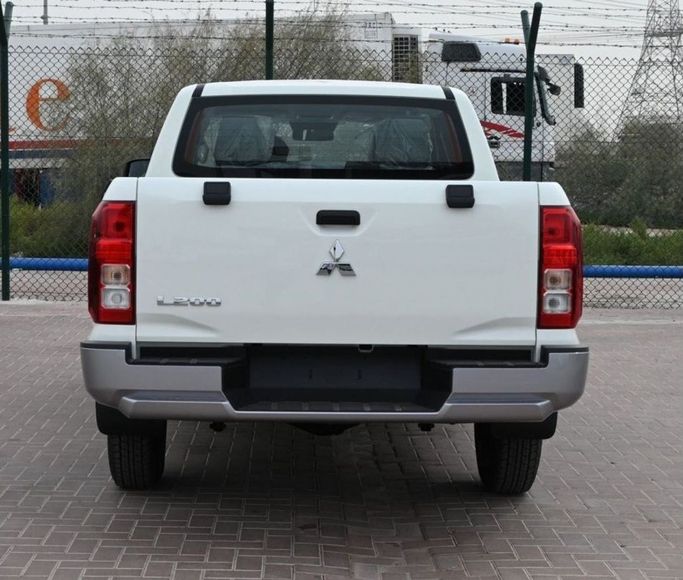 New Mitsubishi L200 V Facelift, 2.4 l, 2024 in Dubai by Mohamed Hakim Motors, White color. Other | AUTO.AE