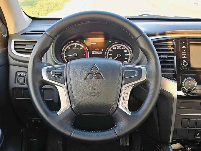 New Mitsubishi L200 V Facelift, 2.4 l, 2022 in Dubai by SK Motors, White color. GCC Specs | AUTO.AE