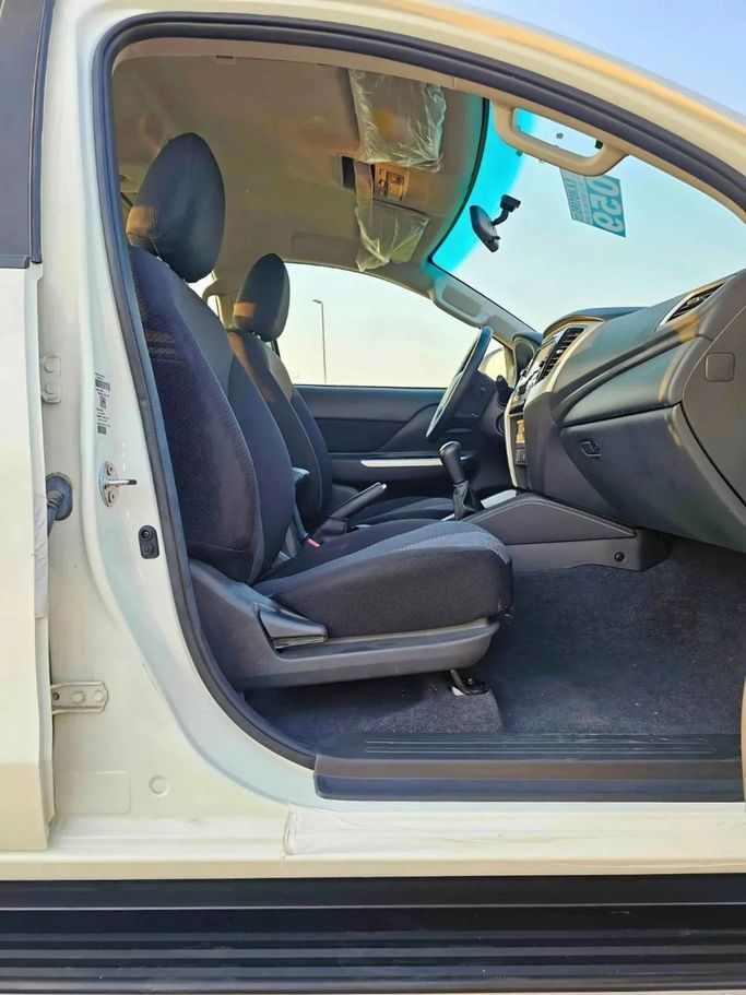 New Mitsubishi L200 V Facelift, 2.4 l, 2022 in Dubai by SK Motors, White color. GCC Specs | AUTO.AE