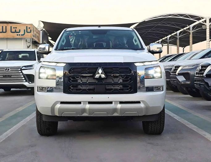 New Mitsubishi L200 VI, 2.4 l, 2024 in Dubai by SK Motors, White color. GCC Specs | AUTO.AE