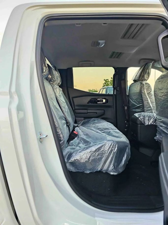 New Mitsubishi L200 VI, 2.4 l, 2024 in Dubai by SK Motors, White color. GCC Specs | AUTO.AE