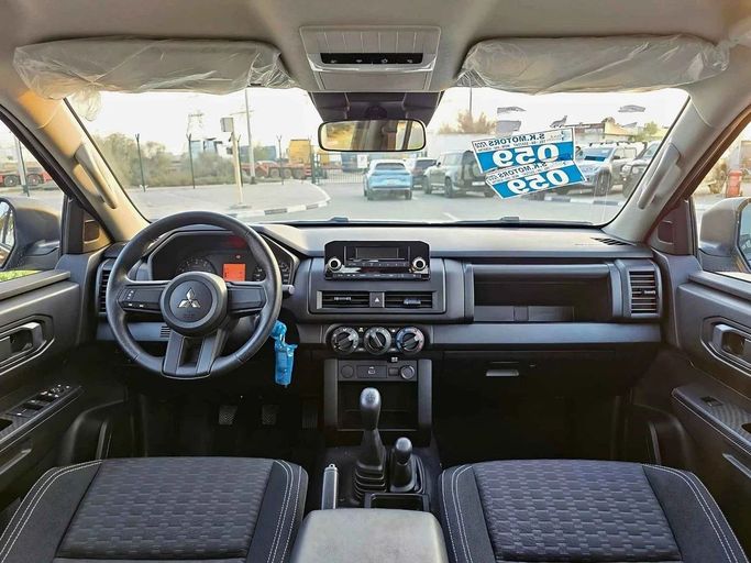 New Mitsubishi L200 VI, 2.4 l, 2024 in Dubai by SK Motors, Black color. GCC Specs | AUTO.AE