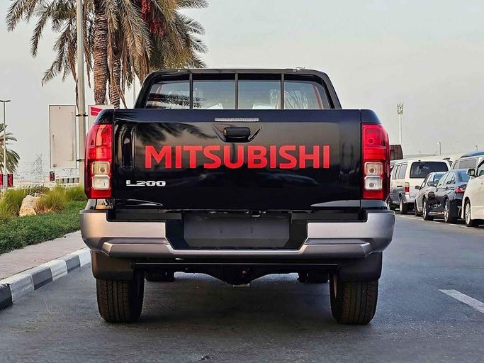 New Mitsubishi L200 VI, 2.4 l, 2024 in Dubai by SK Motors, Black color. GCC Specs | AUTO.AE