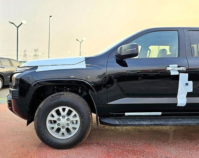 New Mitsubishi L200 VI, 2.4 l, 2025 in Dubai by Soltan Auto, Black color. Other | AUTO.AE