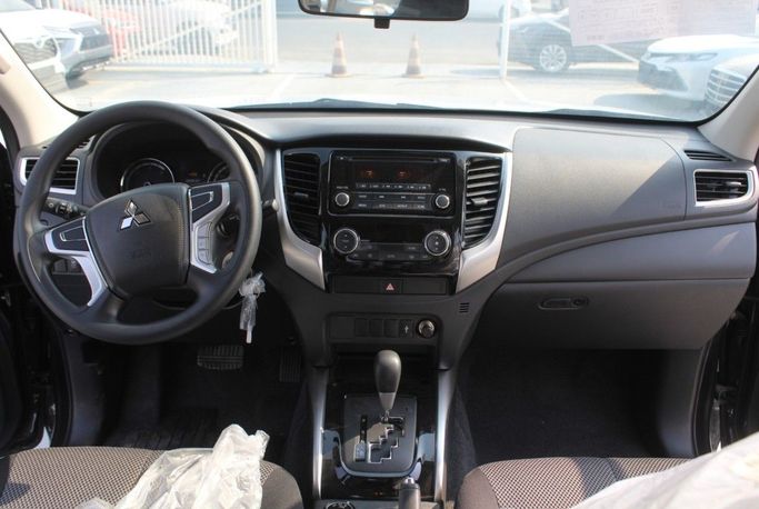 Новый Mitsubishi L200 V Рестайлинг, 2.4 л, 2023 в Дубае от Titanum Cars Серый цвет. Other | AUTO.AE