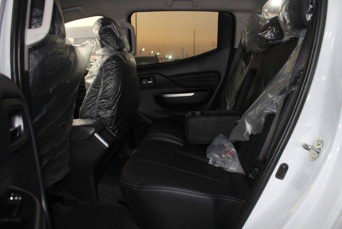 Новый Mitsubishi L200 V Рестайлинг, 2.4 л, 2023 в Дубае от Titanum Cars Белый цвет. Other | AUTO.AE