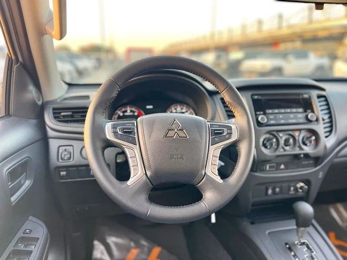 New Mitsubishi L200 V Facelift, 2.4 l, 2024 in Dubai by 66 Motors, White color. Other | AUTO.AE