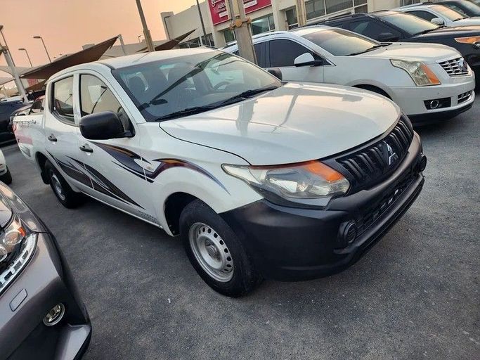 Подержанный Mitsubishi L200 V, 2.4 л, 2016 в Дубае от Abdo Al Muthanna Used Cars Белый цвет. GCC | AUTO.AE
