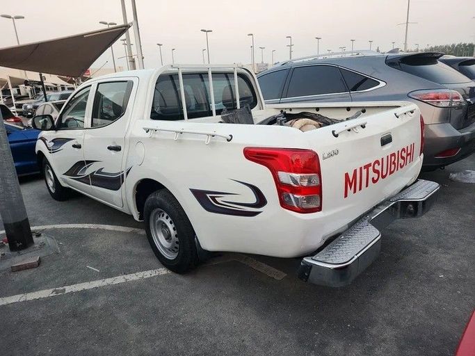 Подержанный Mitsubishi L200 V, 2.4 л, 2016 в Дубае от Abdo Al Muthanna Used Cars Белый цвет. GCC | AUTO.AE