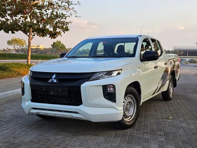 Подержанный Mitsubishi L200 V Рестайлинг, 2.4 л, 2022 в Дубае от NEW ABU TAJ MOTORS Белый цвет. GCC | AUTO.AE