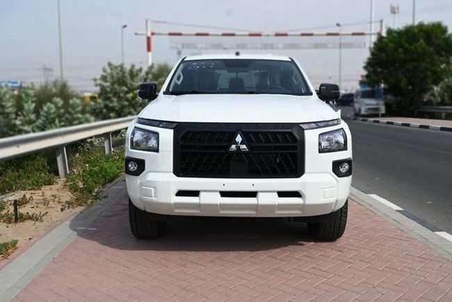 New Mitsubishi L200 VI, 2.4 l, 2024 in Dubai by Hussein Ghulam Motors FZCO, White color. GCC Specs | AUTO.AE