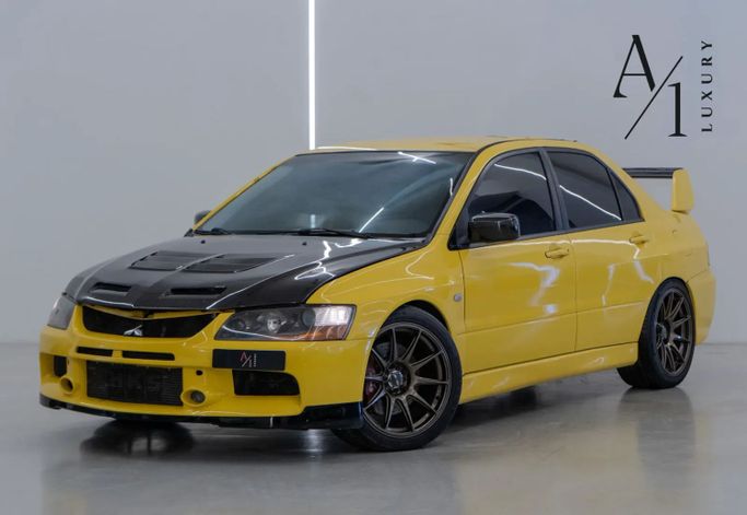 مستعملة Mitsubishi Lancer Evolution تاسعًا, 2.0 l, 2006 في في دبي من A1 Luxury Motors، اللون أصفر. مواصفات الخليج | AUTO.AE | إعلان #255619