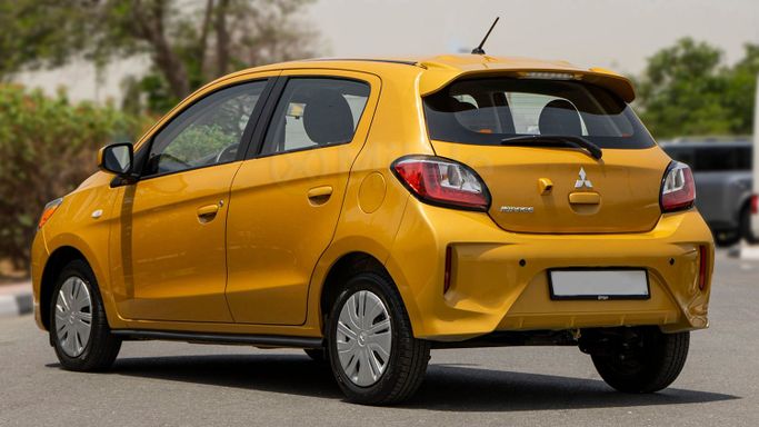 Подержанный Mitsubishi Mirage VI Рестайлинг 2, 1.2 л, 2024 в Дубае от Milele Желтый цвет. Other | AUTO.AE