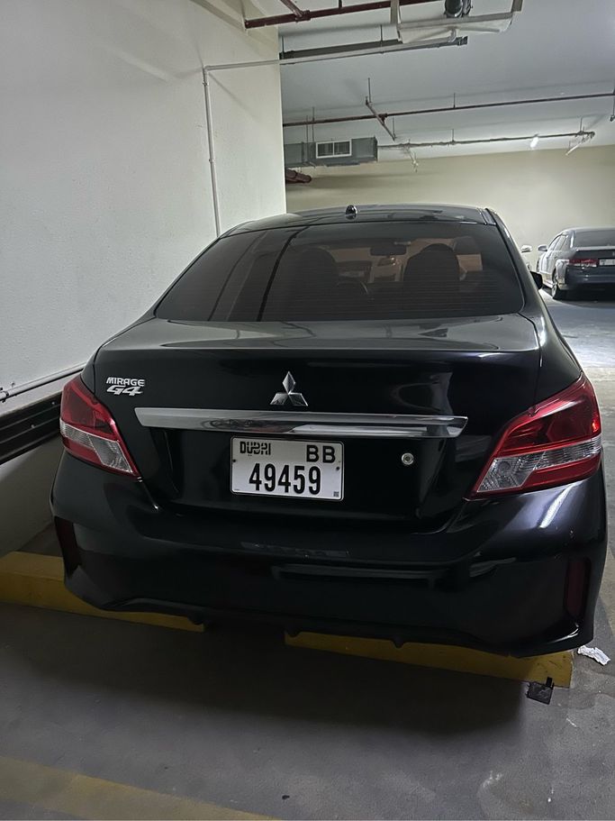 Подержанный Mitsubishi Mirage VI Рестайлинг 2, 1.2 л, 2020 в Дубае Черный цвет.  | AUTO.AE