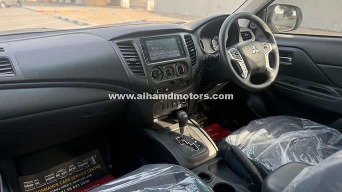 Подержанный Mitsubishi Triton V Рестайлинг, 2.4 л, 2023 в Дубае от Alhamd Motors Белый цвет. Other | AUTO.AE