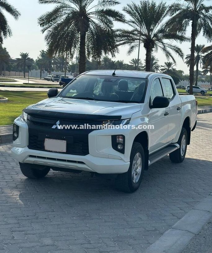 Подержанный Mitsubishi Triton V Рестайлинг, 2.4 л, 2022 в Дубае от Alhamd Motors Белый цвет.  | AUTO.AE | Объявление #258292