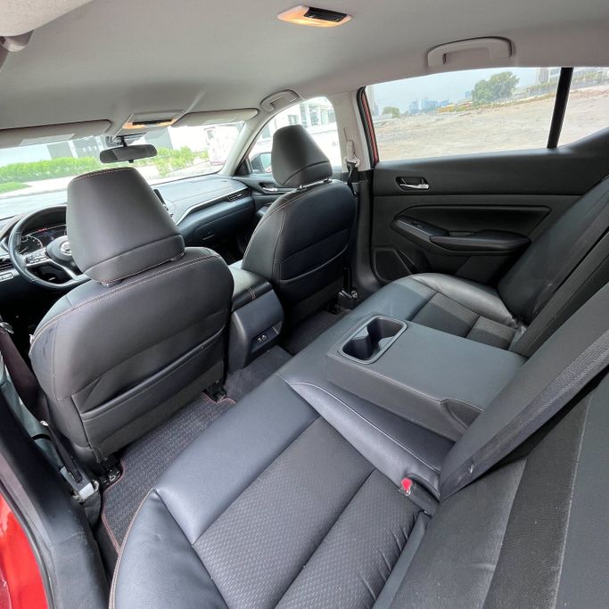 Подержанный Nissan Altima VI (L34), 2.5 л, 2021 в Дубае Оранжевый цвет. Американская | AUTO.AE