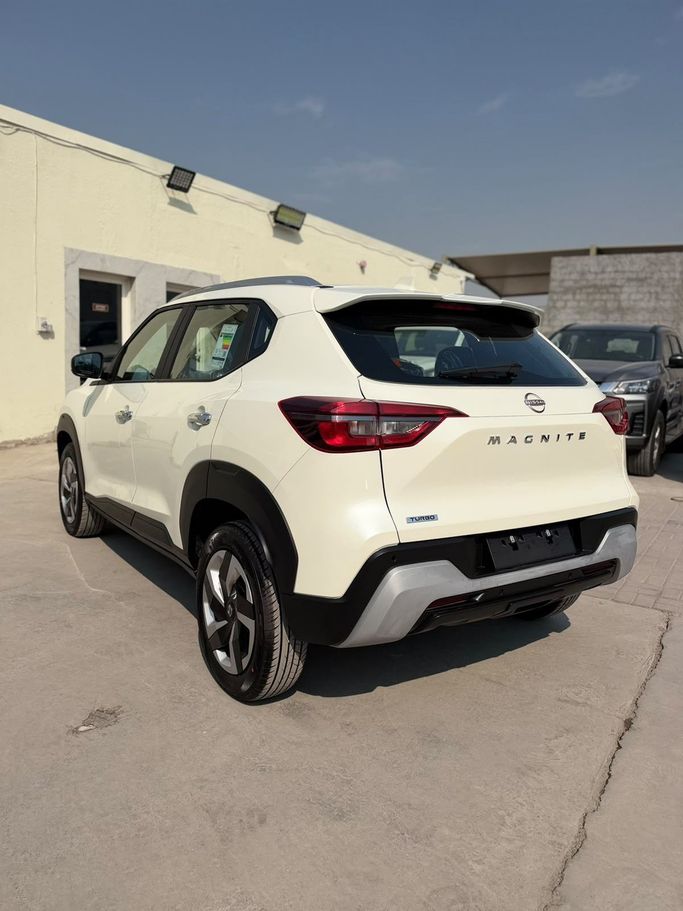 مستعملة Nissan Magnite أنا فيس ليفت، 1.0 لتر، 2026 في الإمارات، دبي من Tamilan Specialized Vehicles Trading LLC، اللون أبيض. مواصفات الخليج | AUTO.AE | إعلان #295410 — صورة 10 من 19