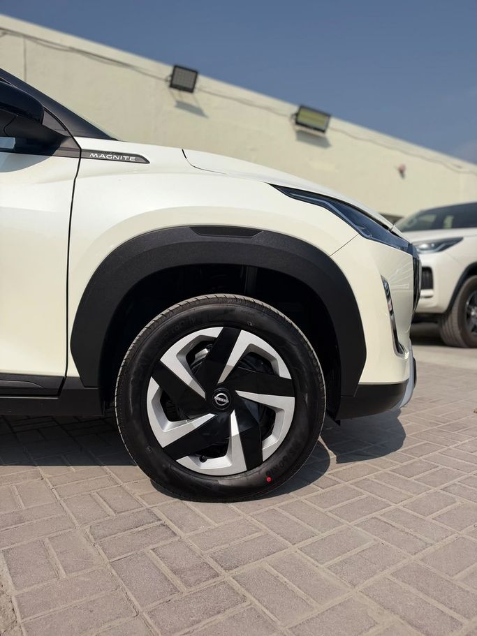 مستعملة Nissan Magnite أنا فيس ليفت، 1.0 لتر، 2026 في الإمارات، دبي من Tamilan Specialized Vehicles Trading LLC، اللون أبيض. مواصفات الخليج | AUTO.AE | إعلان #295410 — صورة 13 من 19